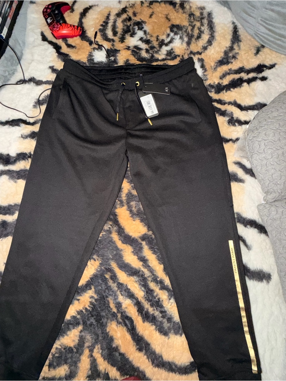 Armani Exchange Black Joggers with Gold Accent Tape